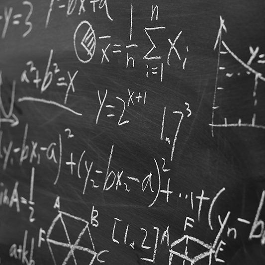 Maths formulas on chalkboard background